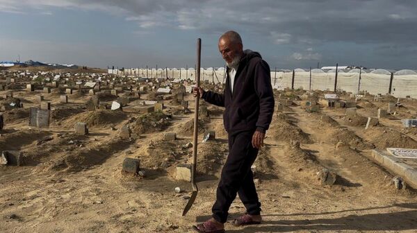 الحانوتي طافش أبو حطب، قطاع غزة  - سبوتنيك عربي