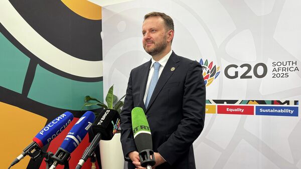 نائب رئيس ديوان الرئاسة الروسية مكسيم أوريشكين في قمة العشرين في جنوب أفريقيا. نائب رئيس ديوان الرئاسة الروسية مكسيم أوريشكين في قمة العشرين في جنوب أفريقيا. - سبوتنيك عربي