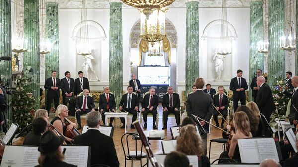 الرئيس الروسي فلاديمير بوتين مع رؤساء الدول الأعضاء في رابطة الدول المستقلة  - سبوتنيك عربي