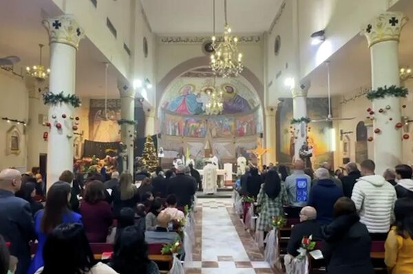 مسيحيو غزة يحيون الميلاد بعد عامين من الحرب 
 - سبوتنيك عربي