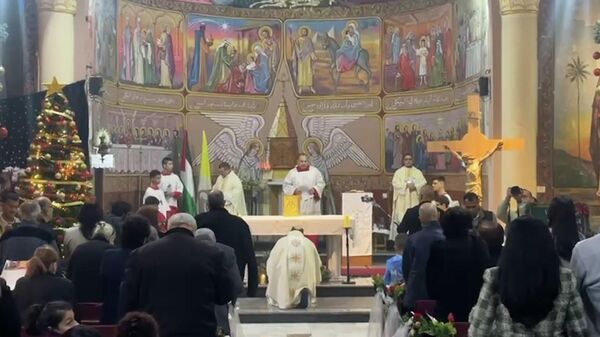 مسيحيو غزة يحيون الميلاد بعد عامين من الحرب 
 - سبوتنيك عربي