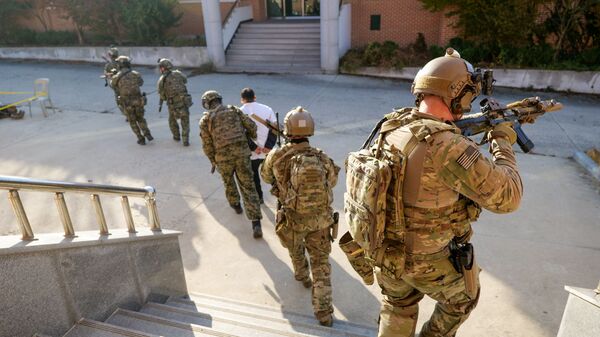 Special Operations Command Korea service members conduct close quarters battle training with their Republic of Korea Special Warfare Command counterparts at Kunsan Air Force Base, South Korea, Nov. 11, 2019 - سبوتنيك عربي