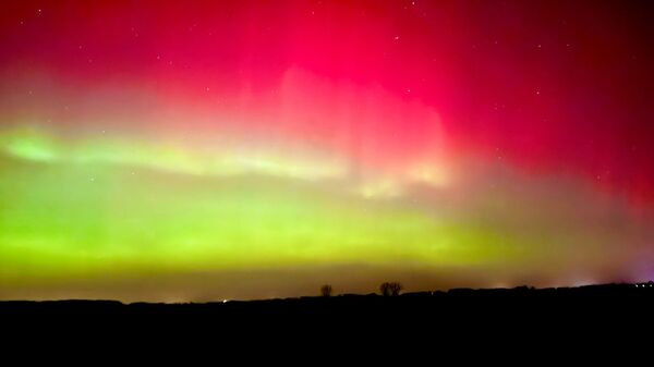 Северное сияние над Саксонией-Анхальт, Германия - سبوتنيك عربي