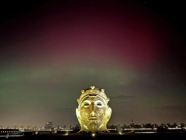صورة لسماء مدينة نيميغن، هولندا، أثناء ظاهرة الشفق القطبي - سبوتنيك عربي