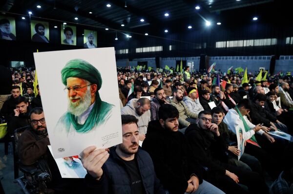 لقاء تضامني في الضاحية الجنوبية دعما لإيران ورفضا للتهديدات الأمريكية - سبوتنيك عربي