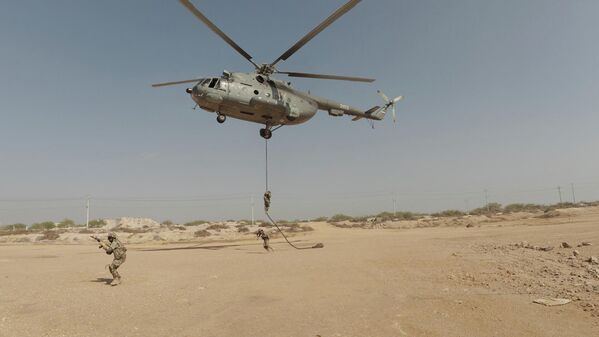 تدريبات للحرس الثوري الإيراني في منطقة مضيق هرمز، 16 فبراير 2026 - سبوتنيك عربي