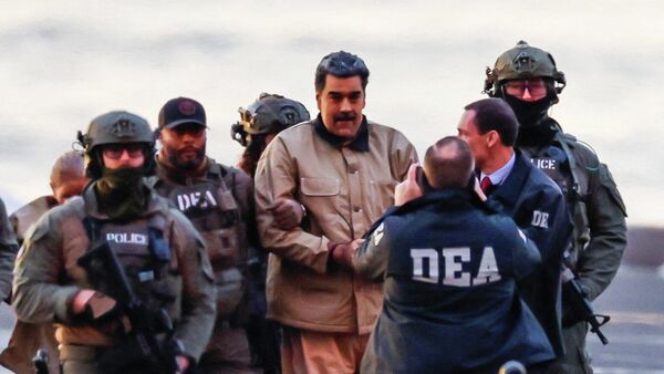 Nicolás Maduro, presidente venezolano, llega al helipuerto del centro de Manhattan, mientras se dirige al juzgado estadounidense Daniel Patrick, el 5 de enero de 2026 - سبوتنيك عربي