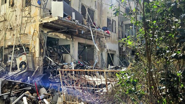 Разрушения в Тель-Авиве в результате ракетной атаки со стороны Ирана - سبوتنيك عربي