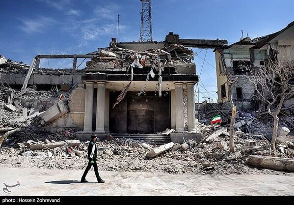 مبان سكنية مدمرة في العاصمة طهران نتيجة الغارات الأمريكية - الإسرائيلية  - سبوتنيك عربي