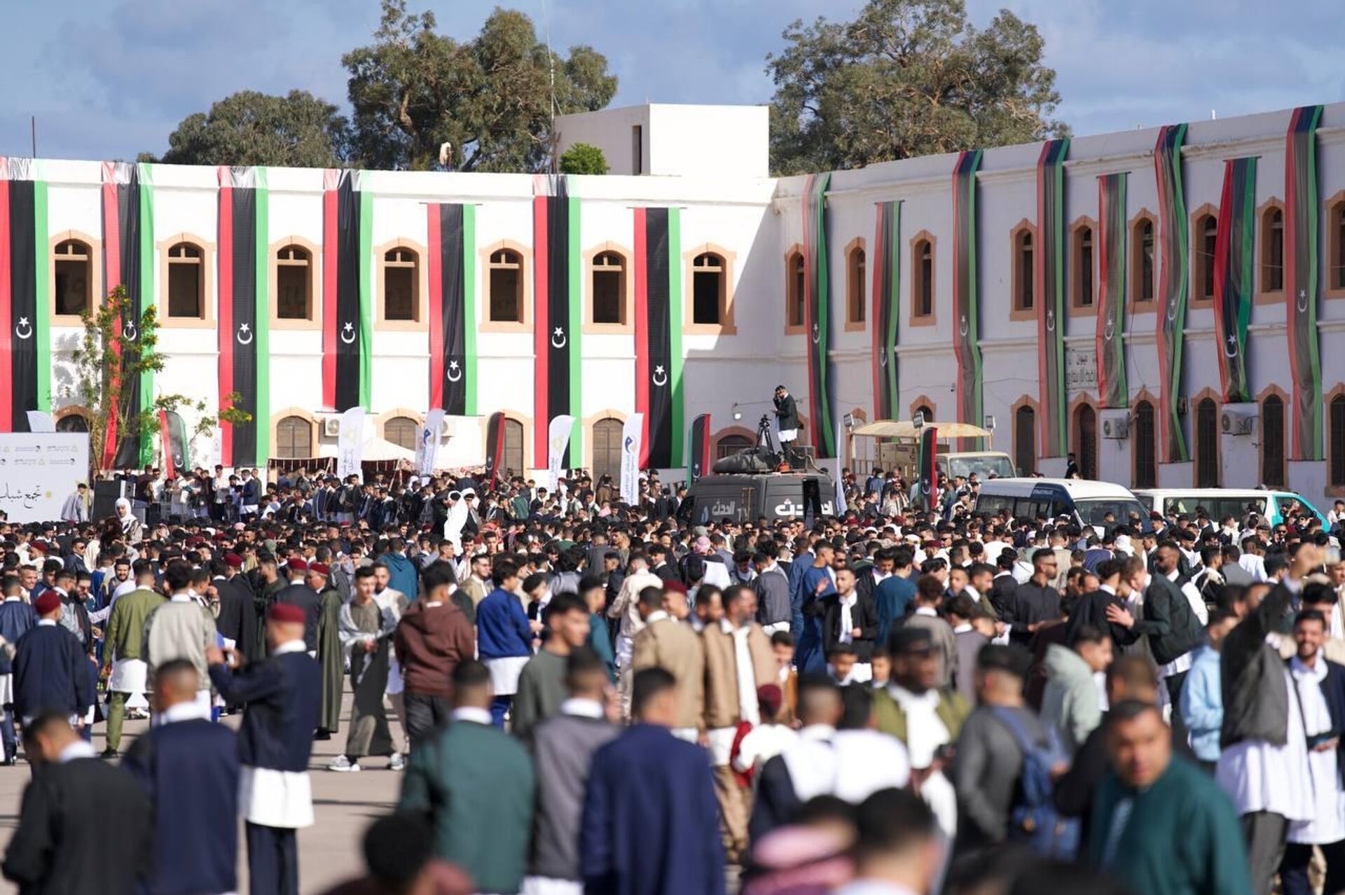 بنغازي الليبية تحتفي بعيد الفطر بمشهد وطني جامع في ساحة الكيش مارس 2025 بنغازي الليبية تحتفي بعيد الفطر بمشهد وطني جامع في ساحة الكيش مارس 2025 - سبوتنيك عربي, 1920, 20.03.2026