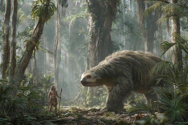 حيوان "الكسلان" العملاق الذي عاش في العصر البليستوسيني داخل الغابة يقف أمام رجل يرتدي زي الإنسان البدائي.  - سبوتنيك عربي