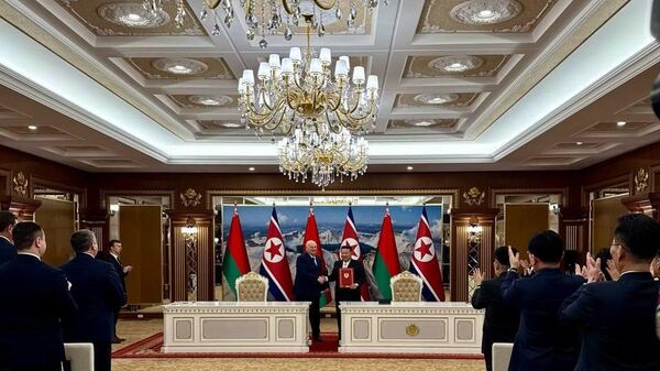 رئيس جمهورية كوريا الديمقراطية الشعبية كيم جونغ أون والرئيس البيلاروسي ألكسندر لوكاشينكو - سبوتنيك عربي