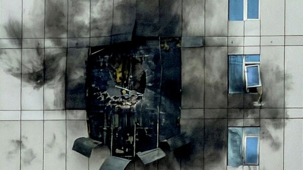 مبنى تضرر جراء هجوم بطائرة مسيرة إيرانية، بعد أن شنت إسرائيل وأمريكا ضربات على إيران، في الجفير، المنامة، البحرين، 1 مارس/ آذار 2026 - سبوتنيك عربي