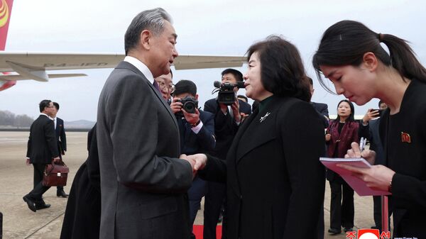 Визит главы МИД Китая Ван И в КНДР  - سبوتنيك عربي
