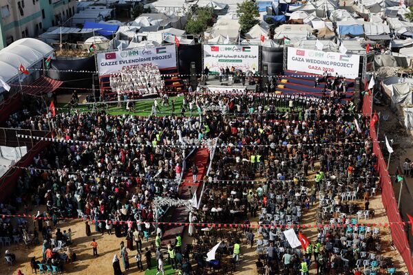 حفل زفاف جماعي لـ50 عريسًا في مدينة غزة، نظمته مؤسسة الإغاثة الإنسانية (IHH) - سبوتنيك عربي