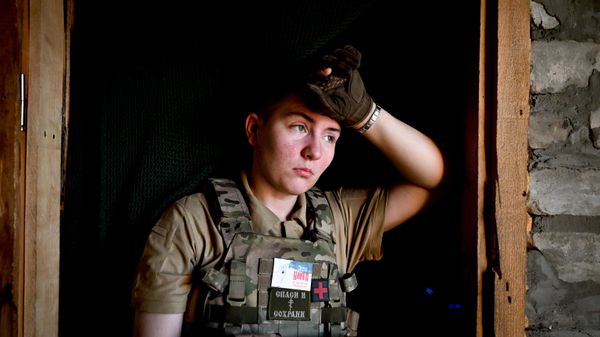 Девушка-боец Добровольческого корпуса отряда Иван Калита в зоне СВО - سبوتنيك عربي