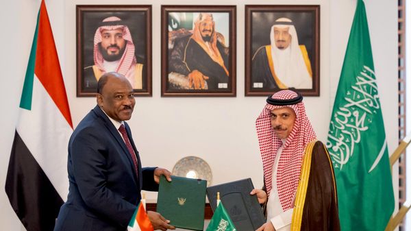 وزير الخارجية السوداني محيي الدين سالم ونظيره السعودي فيصل بن فرحان - سبوتنيك عربي