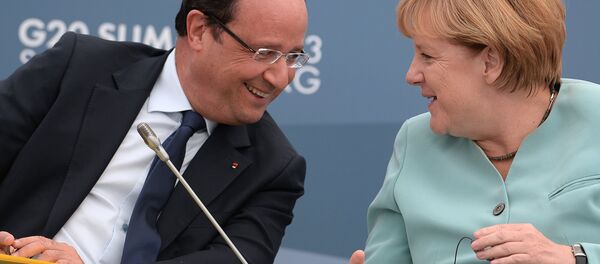 هولاند وميركل هولاند وميركل - سبوتنيك عربي