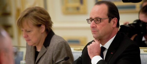 هولاند وميركل - سبوتنيك عربي