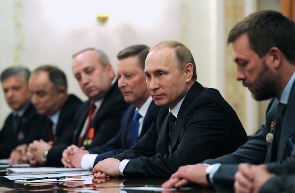 بوتين يلتقي مقاتلين قدامى - سبوتنيك عربي