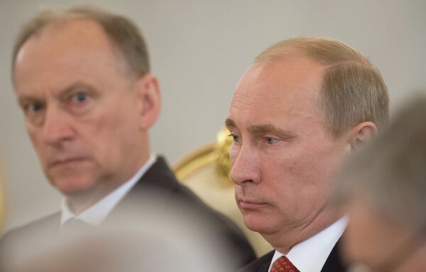 الرئيس الروسي فلاديمير بوتين وأمين مجلس الأمن الروسي نيكولاي باتروشيف - سبوتنيك عربي