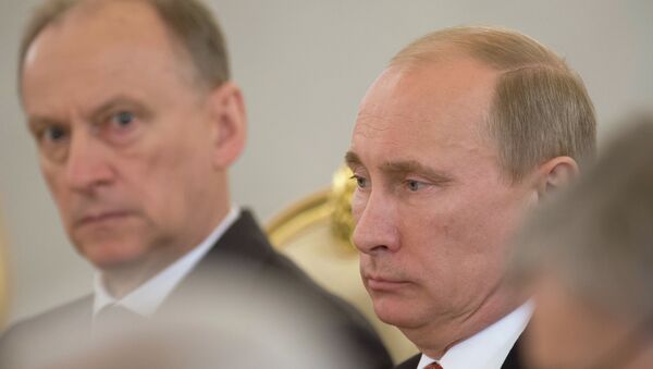 الرئيس الروسي فلاديمير بوتين وأمين مجلس الأمن الروسي نيكولاي باتروشيف - سبوتنيك عربي