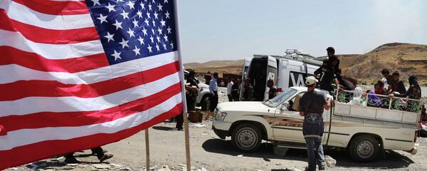 علم الولايات المتحدة على الحدود العراقية السورية - سبوتنيك عربي