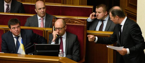 رئيس الوزراء الأوكراني أرسيني ياتسينيوك أثناء حضوره لاجتماع البرلمان الأوكراني - سبوتنيك عربي