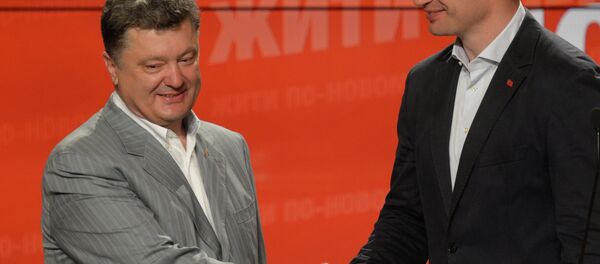 الرئيس الأوكراني بيوتر بوروشينكو وعمدة كييف فيتالي كليتشكو الرئيس الأوكراني بيوتر بوروشينكو وعمدة كييف فيتالي كليتشكو - سبوتنيك عربي