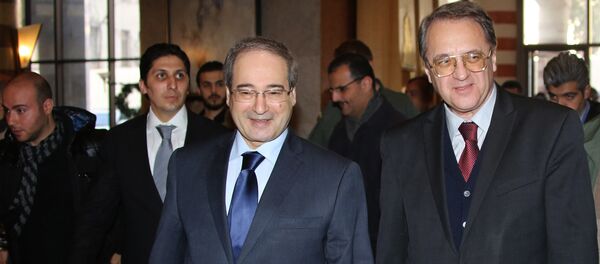 مساعد وزير الخارجية الروسي ميخائيل بوغدانوف مع نظيره السوري فيصل المقداد - سبوتنيك عربي