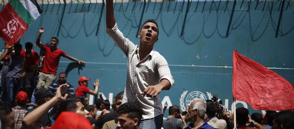 احتجاجات الجبهة الشعبية لتحرير فلسطين ضد تقليص البرامج التعليمية - سبوتنيك عربي