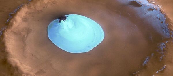 حفرة جليدية على سطح المريخ حفرة جليدية على سطح المريخ - سبوتنيك عربي