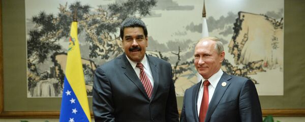 بوتين مع نظيره الفنزويلي نيكولاس مادورو  - سبوتنيك عربي