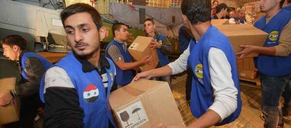 صناديق من المساعدات الإنسانية للشعب السوري - سبوتنيك عربي