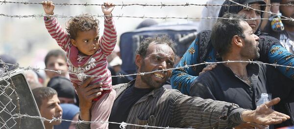 لاجئ سوري على الحدود التركية - سبوتنيك عربي