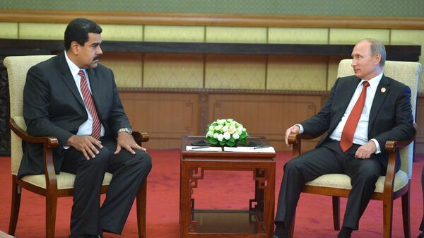 الرئيس الفنزويلي نيكولاس مادورو والرئيس الروسي فلاديمير بوتين - سبوتنيك عربي