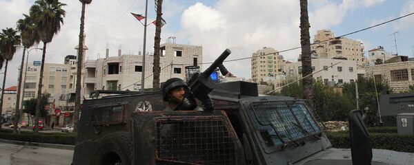 اشتباكات بيت قوات الشرطة الإسرائيلية والفلسطينيين في الضفة الغربية - سبوتنيك عربي