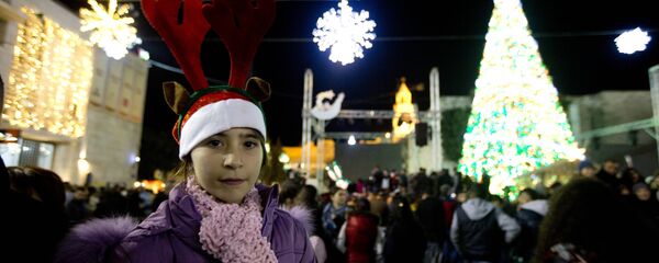 الفلسطينيون يستعدون لإستقبال عيد الميلاد المجيد في بيت لحم - سبوتنيك عربي