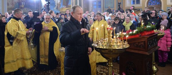 بوتين يشارك المواطنين في احتفالات عيد الميلاد المجيد - سبوتنيك عربي