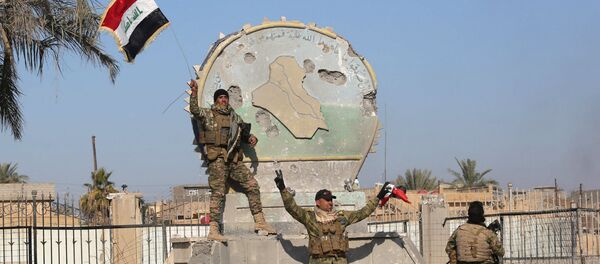 قوات الأمن العراقية بعد تحرير الرمادي من قبضة داعش - سبوتنيك عربي