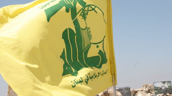 علم وشعار حزب الله - سبوتنيك عربي