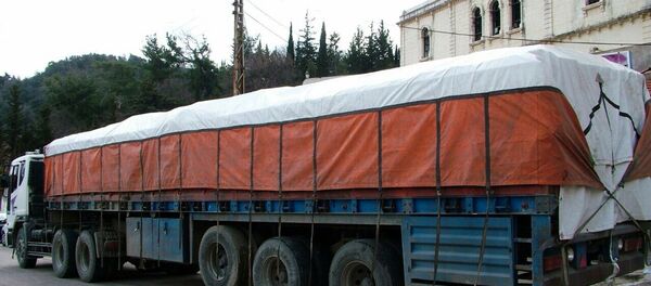 وصول مساعدات روسية إلى مطار حميميم في اللاذقية - سبوتنيك عربي