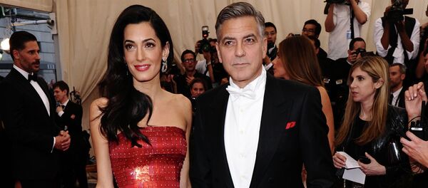 جورج كلوني وزوجته - سبوتنيك عربي