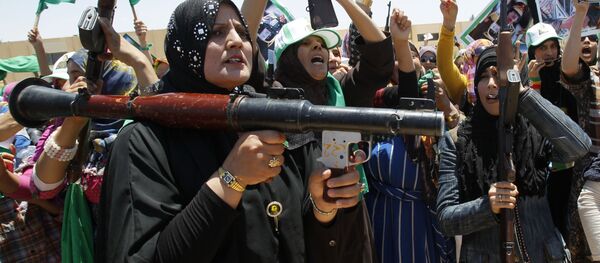 حشد من أنصار معمر القذافي - سبوتنيك عربي