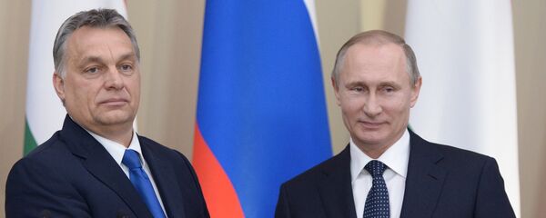 الرئيس الروسي فلاديمير بوتين ورئيس وزراء هنغاريا فيكتور أوربان - سبوتنيك عربي
