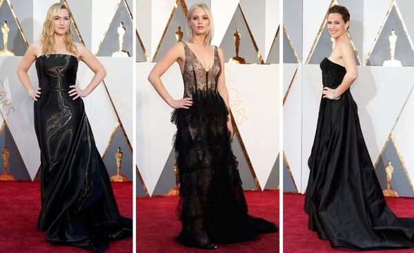 الممثلة كيت وينسلت (يسار) وجينيفر غارنير (وسط) يلتقطون الصور على السجادة الحمراء عند حضورهما للحفل الـ 88 لتوزيع جوائز أوسكار، هوليوود بكاليفورنيا، 28 فبراير/ شباط 2016. - سبوتنيك عربي