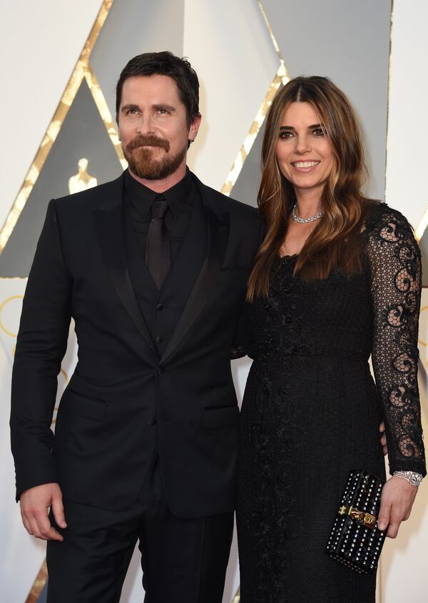 الممثل كريستيان بيل وزوجته سيبي بلازك عند حضورهم الحفل الـ88 لتوزيع جوائز أوسكار، 28 فبراير/ شباط 2016. - سبوتنيك عربي