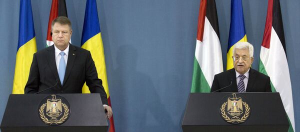 الرئيس عباس في مؤتمر صحفي مشترك مع الرئيس الروماني كلاوس يوهانس في مقر الرئاسة بمدينة رام الله - سبوتنيك عربي