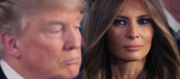 ترامب وزوجته ميلانيا - سبوتنيك عربي