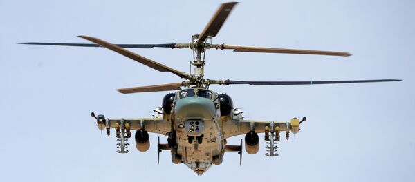 قوات الجيش العربي السوري يستخدمون المروحية الروسية كا-52 أليغاتور خلال العمليات العسكرية لتحرير مدينة القريتين من تنظيم داعش. - سبوتنيك عربي